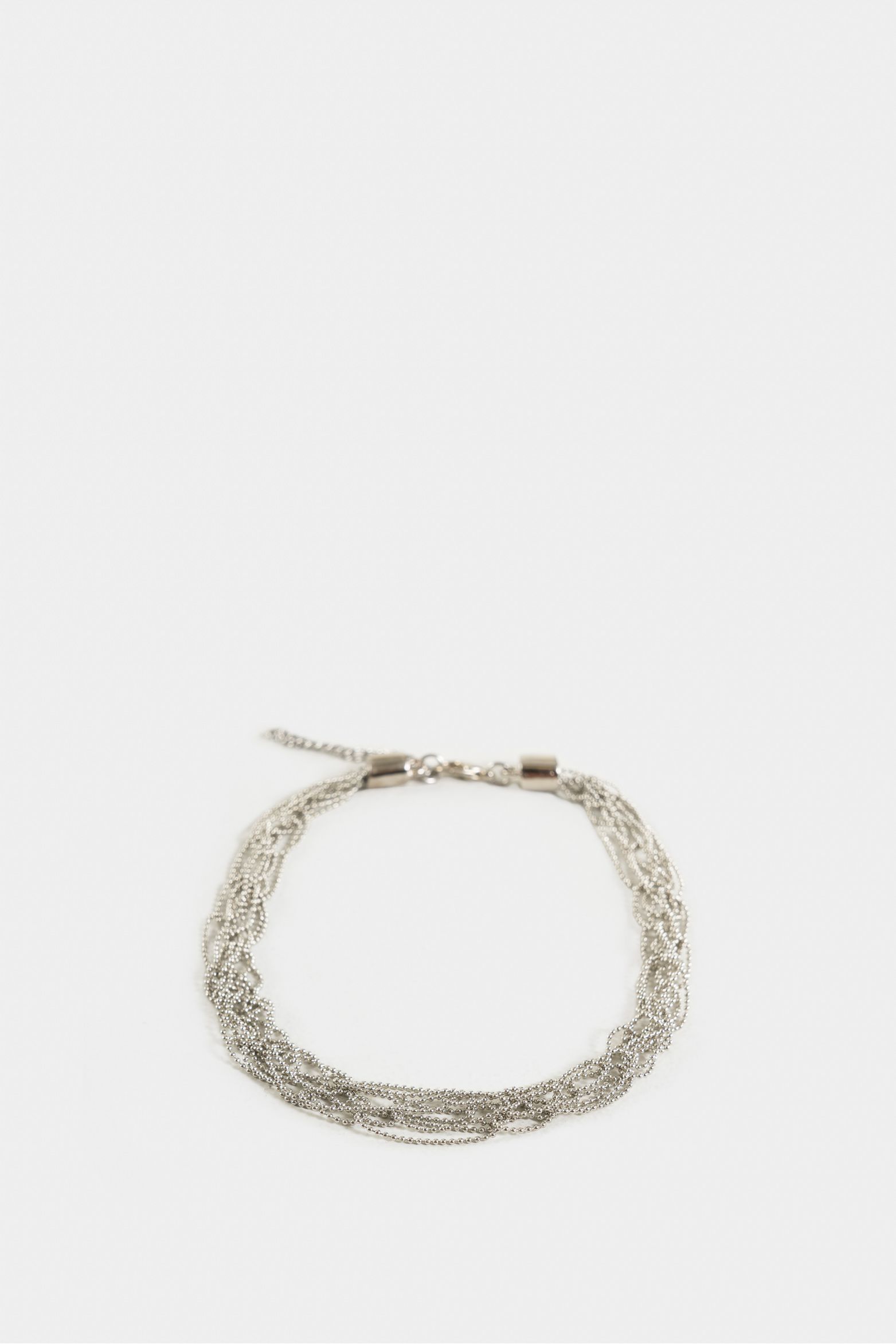 Manilla salina para mujer en cadena tejida