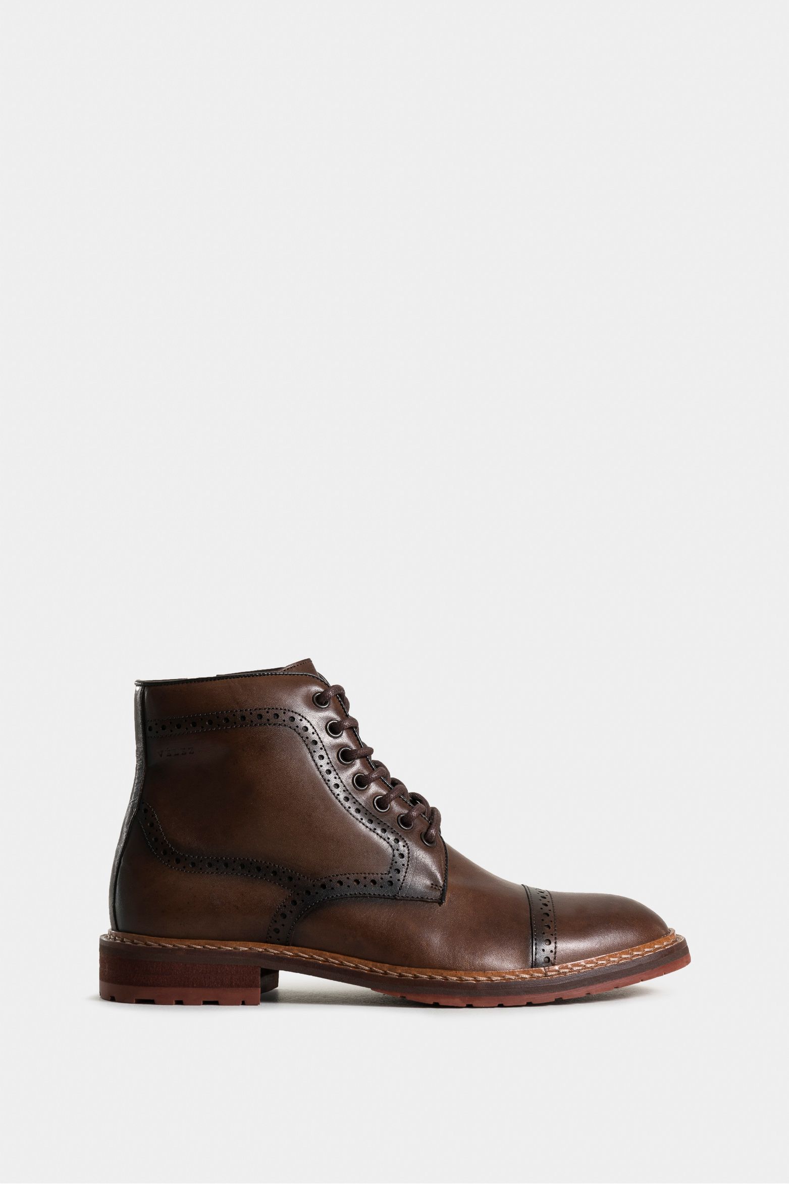 Botas estepa de cuero liso para hombre detalle artesanal chiripiado