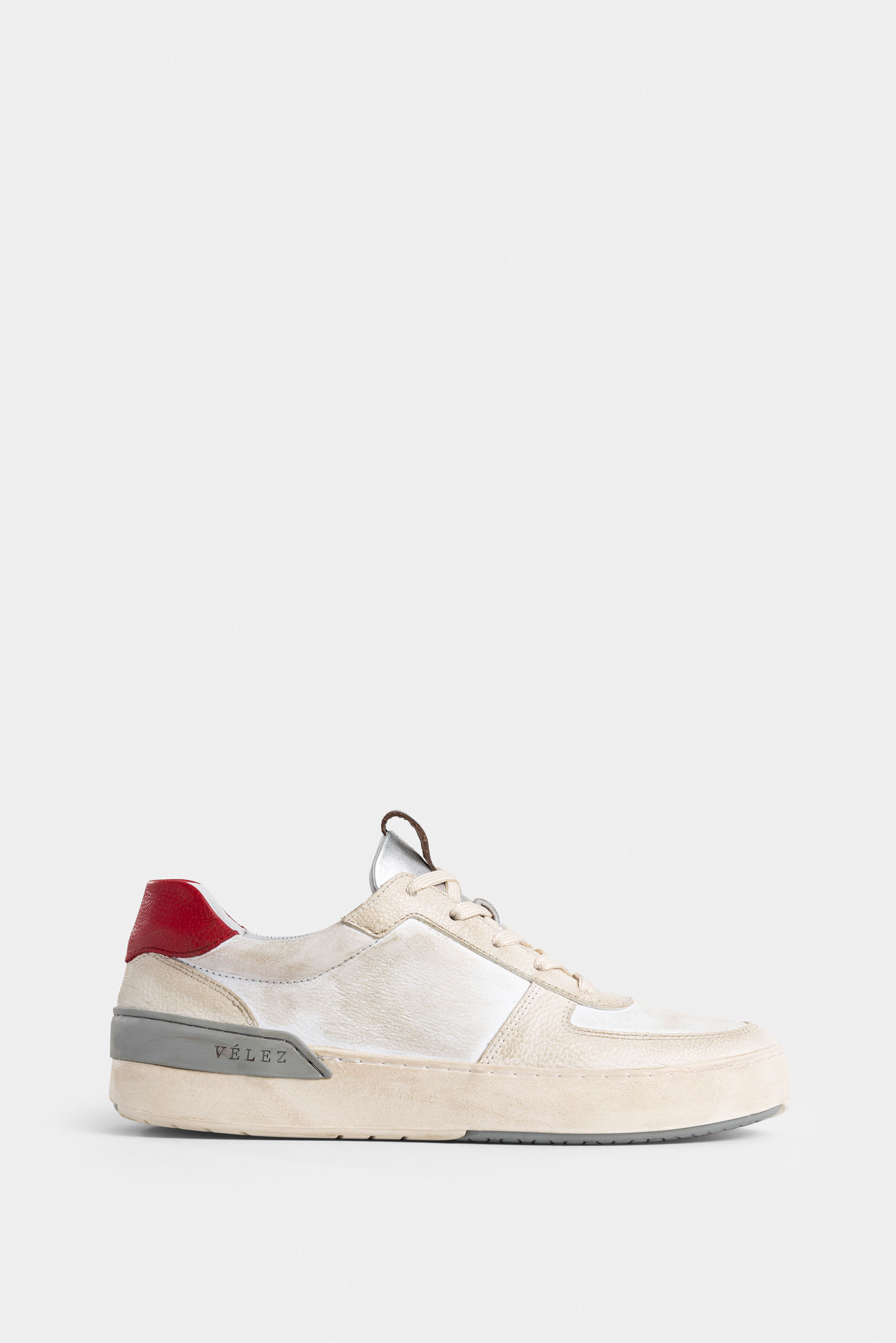 Tenis clavel en combinación de cueros para mujer casual